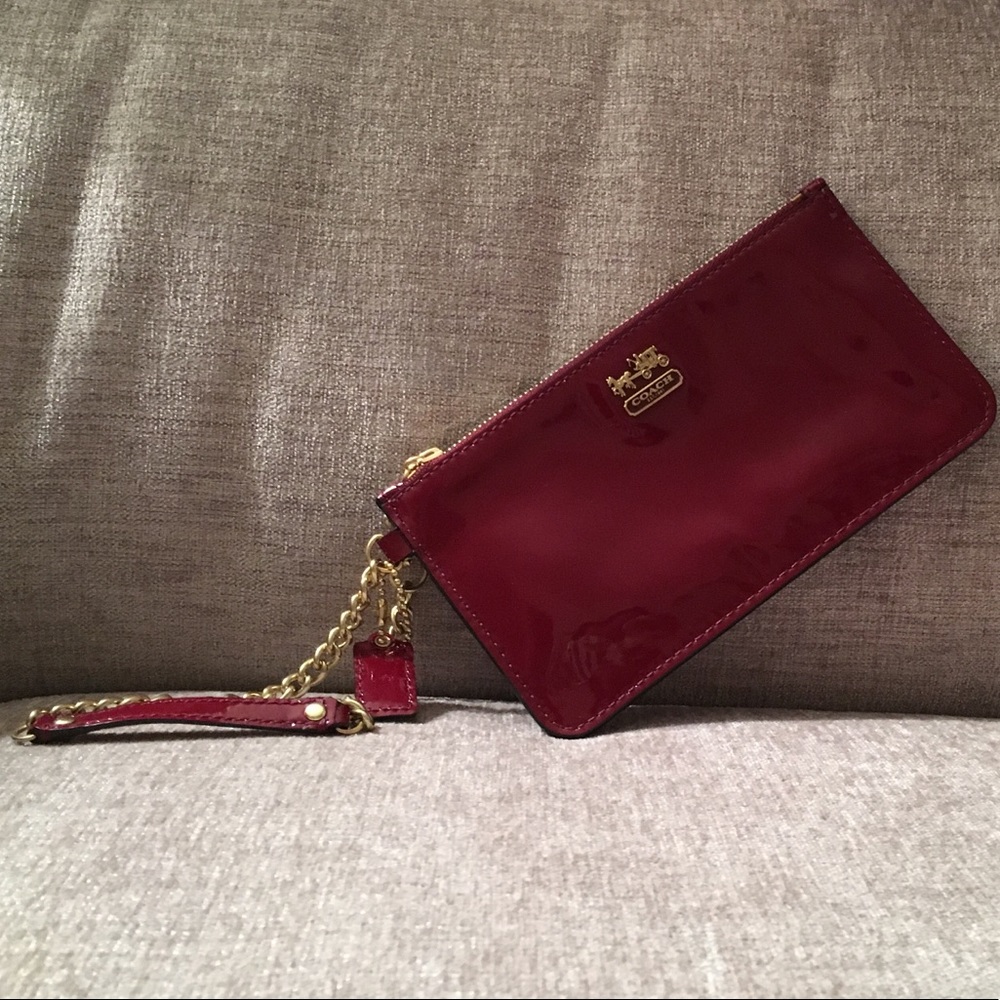 Dark red Coach wristlet